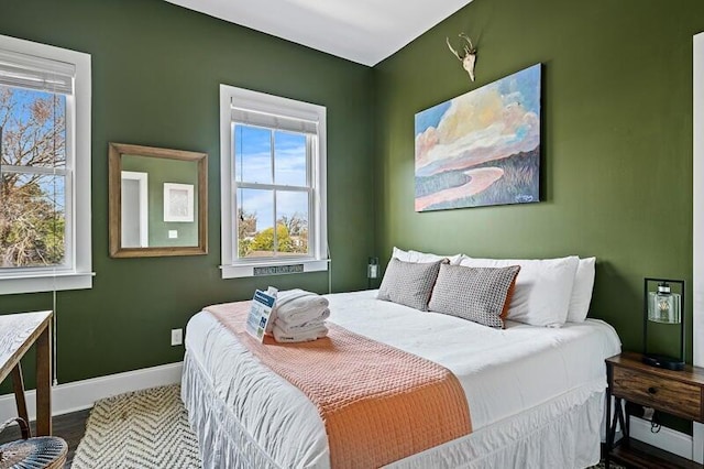 162 Spring St, Charleston, SC 29403 - bedroom featuring multiple windows and baseboards