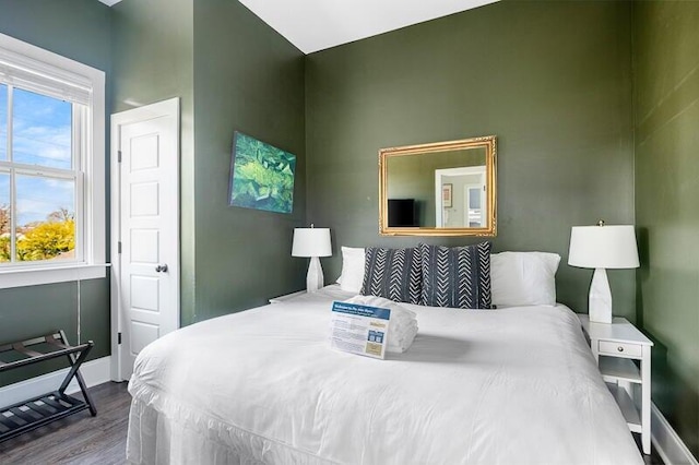 162 Spring St, Charleston, SC 29403 - bedroom with wood finished floors and baseboards