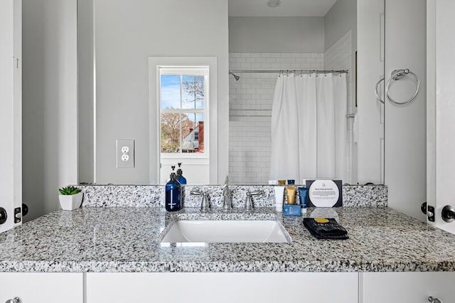 162 Spring St, Charleston, SC 29403 - full bathroom with vanity and a shower with curtain