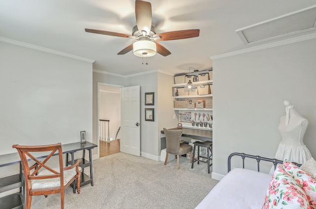 carpeted bedroom with ornamental molding and ceiling fan