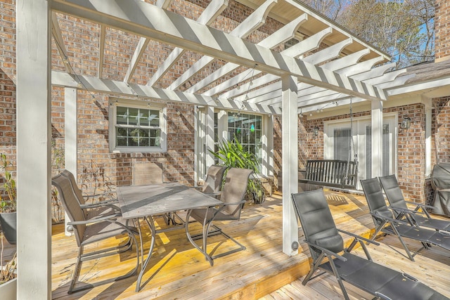 wooden deck featuring a pergola