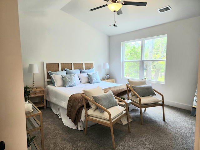 carpeted bedroom featuring a ceiling fan, lofted ceiling, baseboards, and visible vents