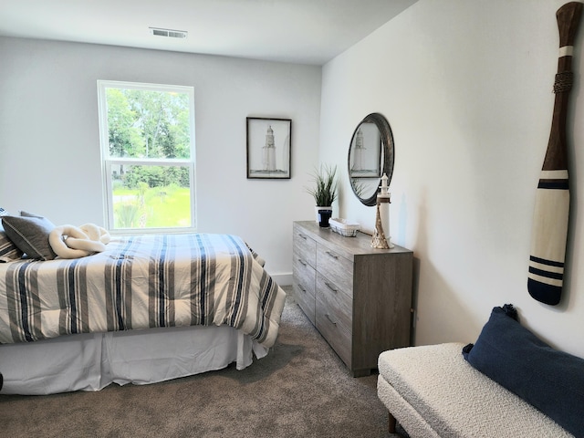 bedroom with carpet flooring and visible vents