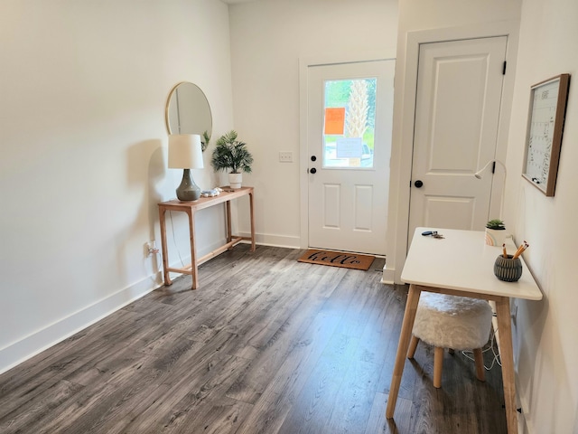 entrance foyer with baseboards and dark wood-style flooring