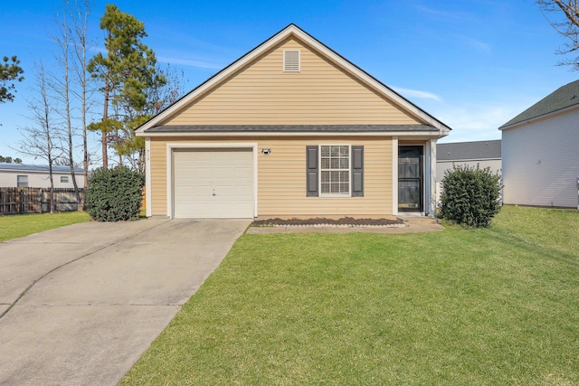 view of front of home with an attached garage, fence, a front lawn, and concrete driveway