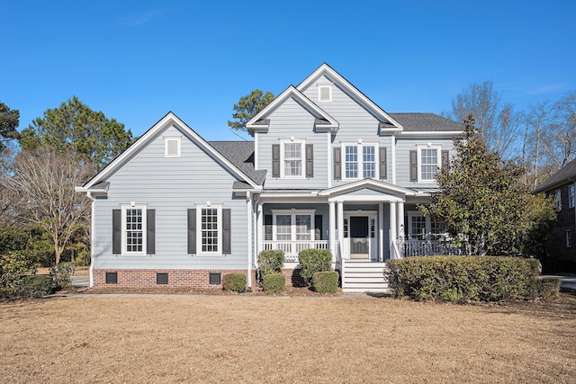 view of front of home featuring a porch and a front lawn