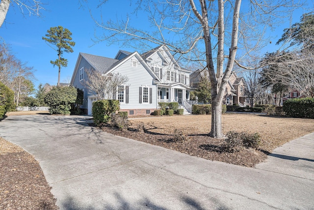 view of side of home with a garage