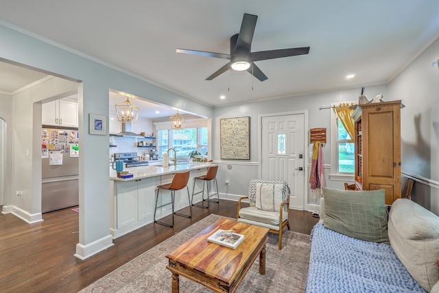 1188 Camden St, North Charleston, SC 29405 - living room featuring ceiling fan, baseboards, ornamental molding, and dark wood finished floors