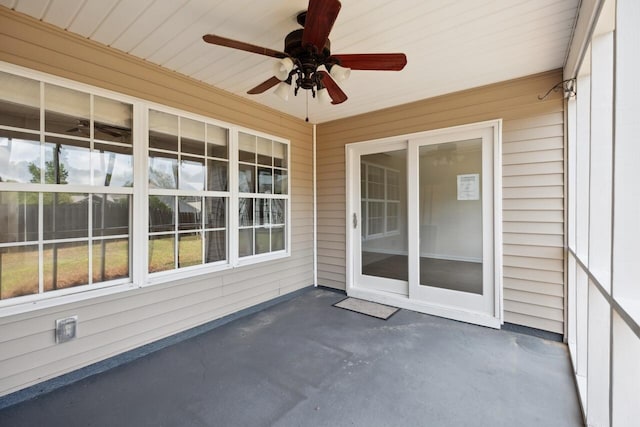view of patio featuring ceiling fan