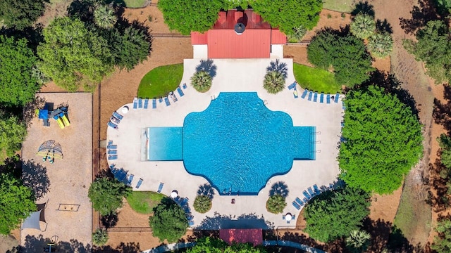 drone / aerial view of a pool area