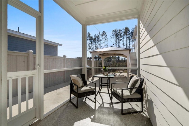 sunroom featuring a healthy amount of sunlight