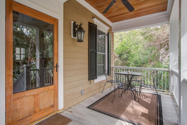 balcony featuring covered porch and a ceiling fan