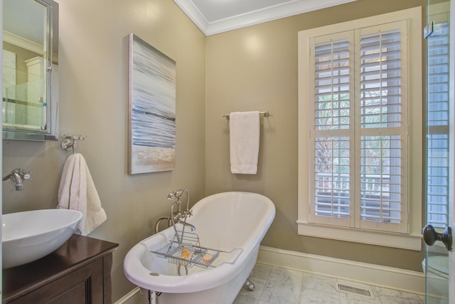 full bathroom featuring baseboards, visible vents, a soaking tub, ornamental molding, and marble finish floor