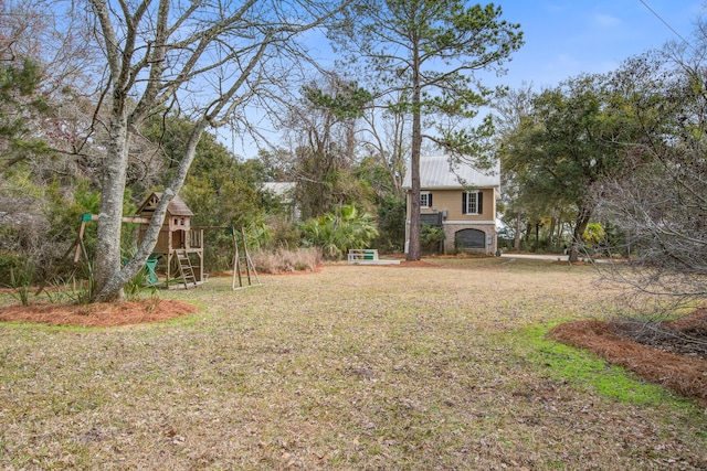 view of yard featuring a playground