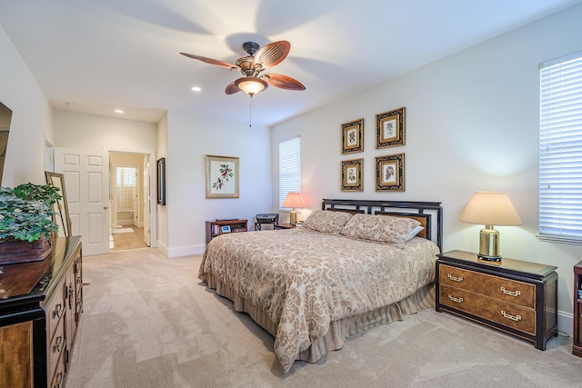 bedroom with light carpet, ceiling fan, recessed lighting, and baseboards