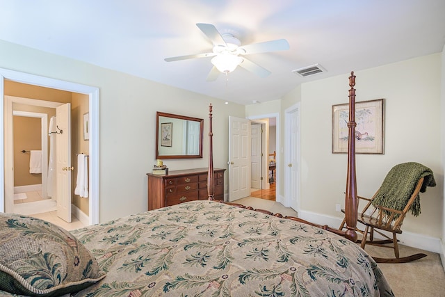 bedroom featuring a ceiling fan, visible vents, light carpet, and baseboards