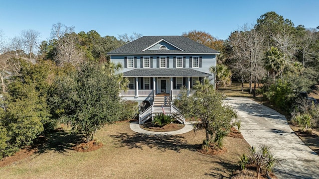 view of front of house with covered porch and stairs