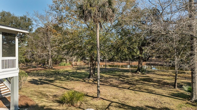 view of yard featuring a water view