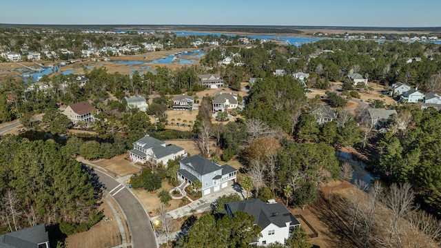 aerial view featuring a water view and a residential view