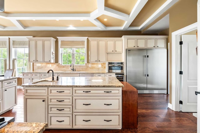 2636 Anchor Watch Dr, Wadmalaw Island, SC 29487 - kitchen featuring cream cabinets, a sink, appliances with stainless steel finishes, and coffered ceiling