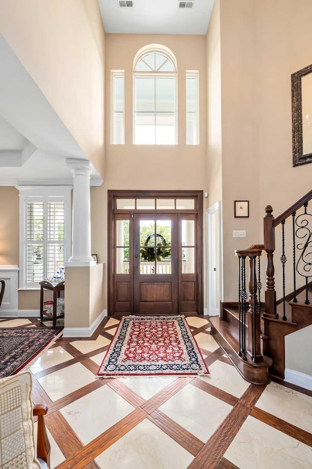 2636 Anchor Watch Dr, Wadmalaw Island, SC 29487 - entryway with stairway, a high ceiling, baseboards, and visible vents