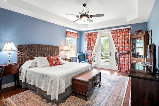 2636 Anchor Watch Dr, Wadmalaw Island, SC 29487 - bedroom featuring a tray ceiling, ceiling fan, access to outside, and wood finished floors