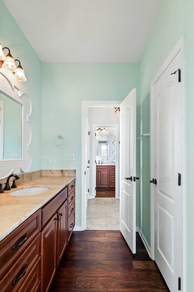2636 Anchor Watch Dr, Wadmalaw Island, SC 29487 - bathroom featuring vanity, baseboards, and wood finished floors
