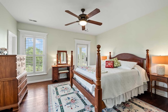 2636 Anchor Watch Dr, Wadmalaw Island, SC 29487 - bedroom with multiple windows, visible vents, dark wood-style flooring, and baseboards
