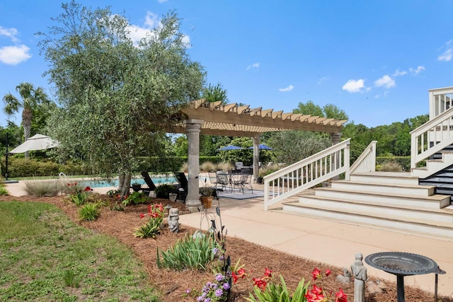 2636 Anchor Watch Dr, Wadmalaw Island, SC 29487 - view of patio featuring a pergola, stairs, and an outdoor pool