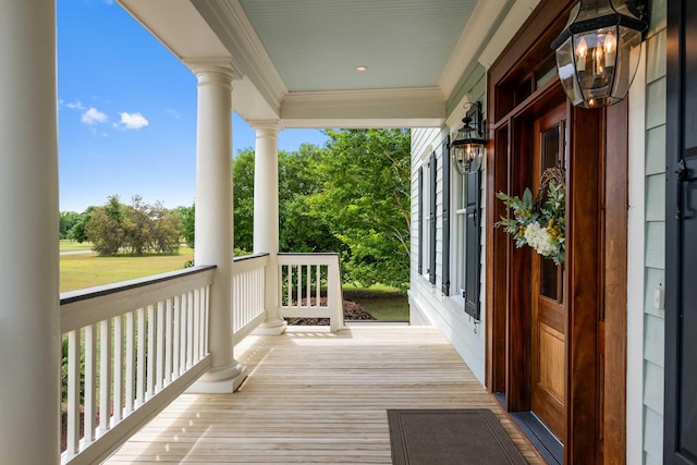 2636 Anchor Watch Dr, Wadmalaw Island, SC 29487 - wooden deck featuring covered porch