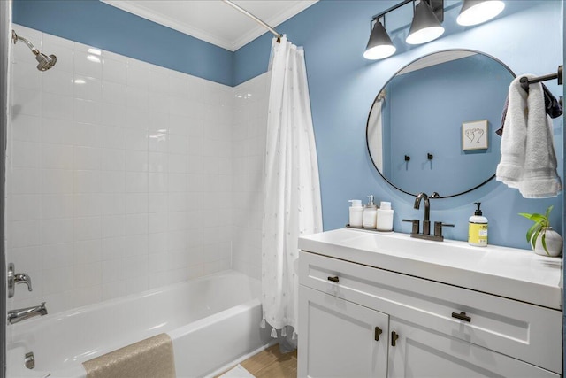 bathroom featuring vanity, crown molding, and shower / tub combo with curtain