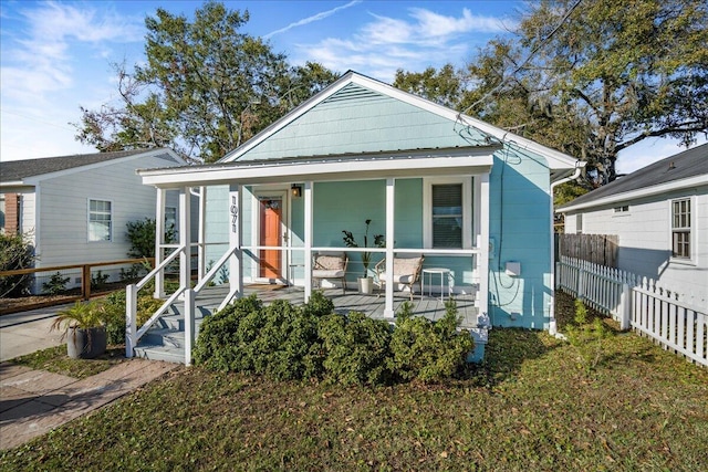 bungalow with a front yard