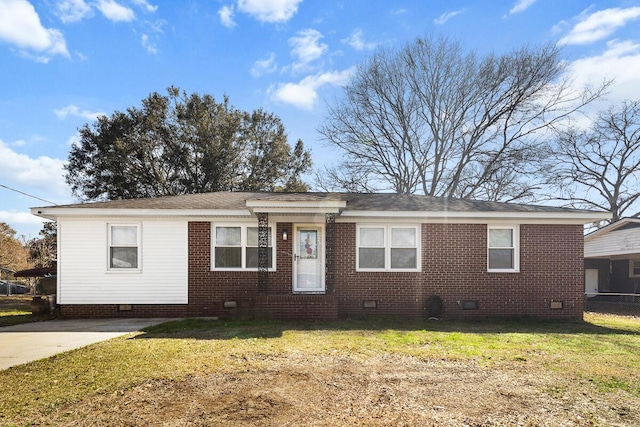 view of front of home with crawl space, brick siding, and a front lawn