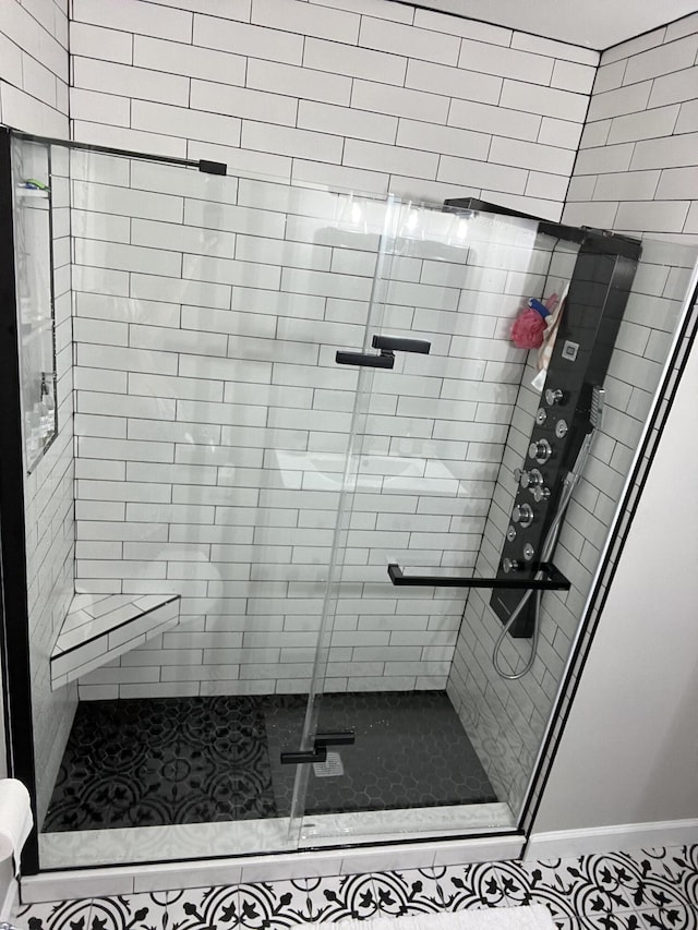 full bath featuring a stall shower