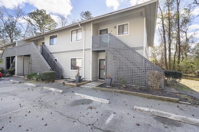 view of front of property with stairway