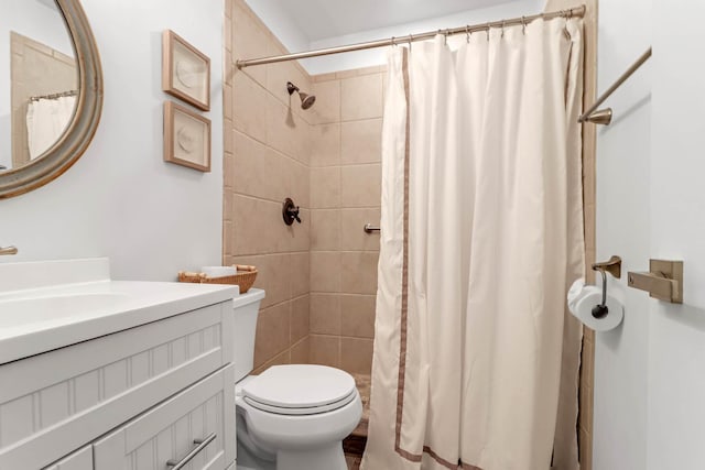 4 Beach Club Villas, Isle Of Palms, SC 29451 - bathroom featuring toilet, vanity, and tiled shower