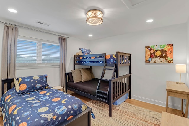 4 Beach Club Villas, Isle Of Palms, SC 29451 - bedroom with wood finished floors, baseboards, and recessed lighting