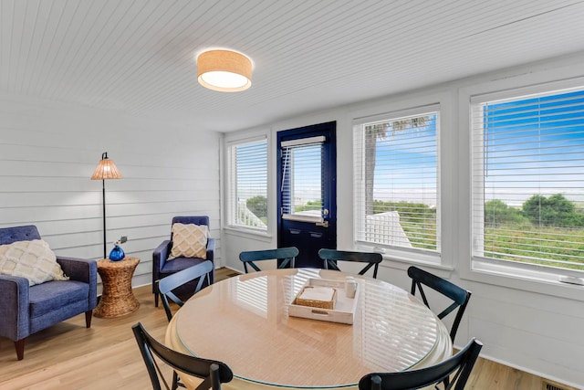 4 Beach Club Villas, Isle Of Palms, SC 29451 - dining space featuring light wood-type flooring and wood ceiling