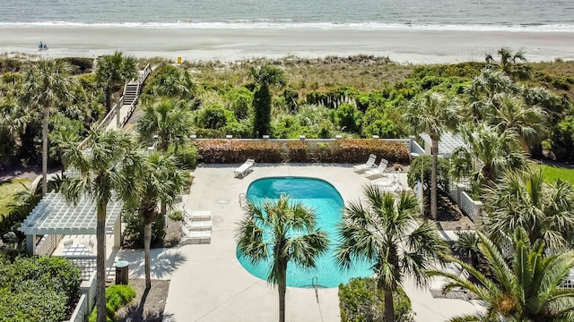 4 Beach Club Villas, Isle Of Palms, SC 29451 - view of pool with view of water and beach and a patio