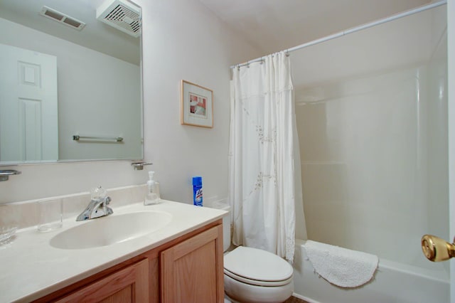 bathroom with vanity, shower / bath combination with curtain, toilet, and visible vents