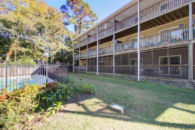 view of property featuring fence