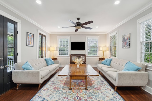 living room featuring ornamental molding, french doors, dark hardwood / wood-style flooring, and ceiling fan