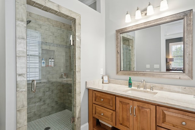 bathroom with vanity and walk in shower