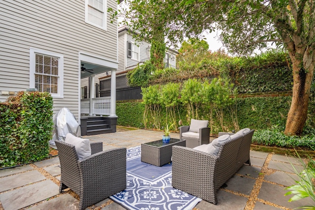 view of patio featuring ceiling fan and outdoor lounge area