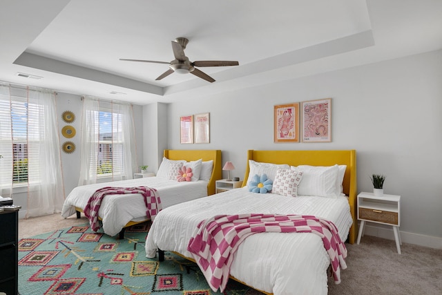 4585 Summey St, North Charleston, SC 29405 - bedroom with a raised ceiling, carpet, a ceiling fan, and baseboards