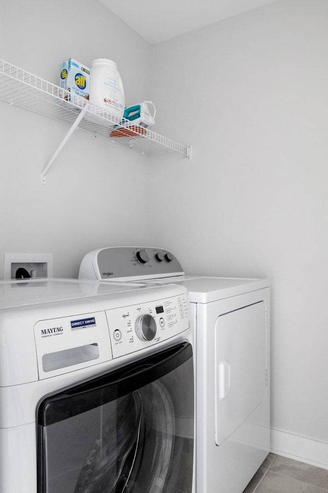 4585 Summey St, North Charleston, SC 29405 - clothes washing area with independent washer and dryer and baseboards