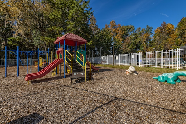 community playground featuring fence