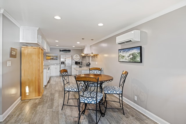 4940 Lambs Rd, North Charleston, SC 29418 - dining space with a wall mounted air conditioner, light wood finished floors, ornamental molding, and recessed lighting