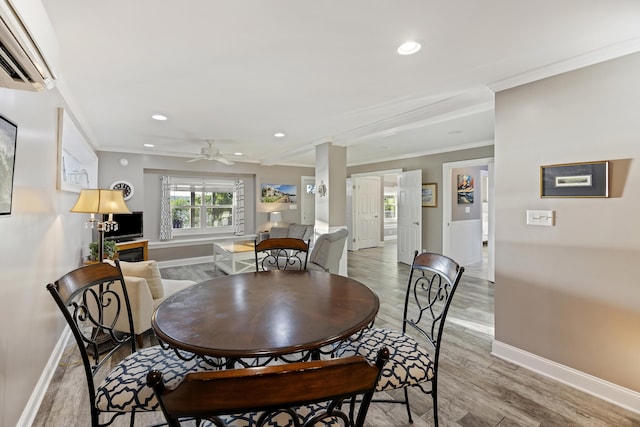 4940 Lambs Rd, North Charleston, SC 29418 - dining area featuring a wall mounted AC, crown molding, recessed lighting, a ceiling fan, and light wood-style flooring