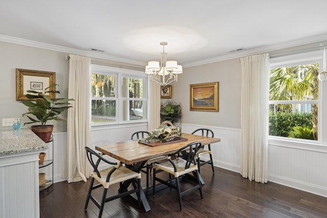4940 Lambs Rd, North Charleston, SC 29418 - dining room with a chandelier, wainscoting, dark wood-style flooring, and crown molding